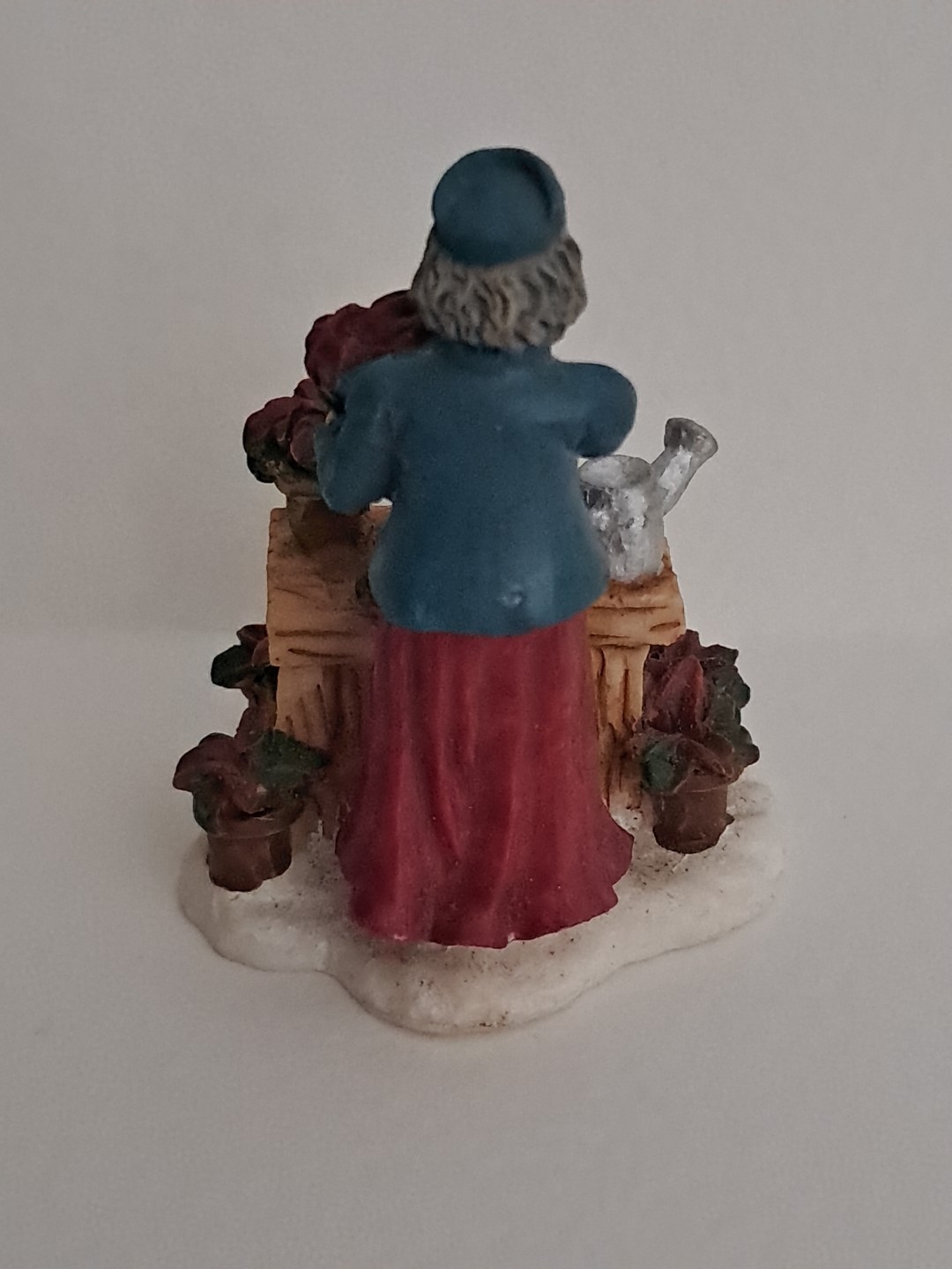 Grandeur Noel Village Lady w/Poinsettias Christmas 1999 Figure Replacement
